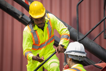 Engineer man Team in Safety Gear Control Containers Box at Industrial Site, Container Yard Workers...