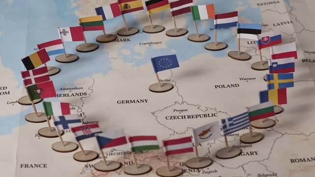 close-up of european union countries marked with national flags on a world map, symbolizing unity, diplomacy, and international cooperation