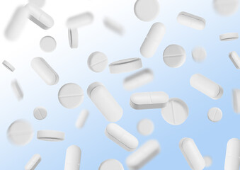 Many different pills flying on light blue gradient background