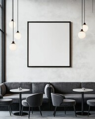 Modern cafe interior with gray sofa, empty frame, and pendant lights.