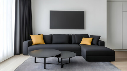 Modern living room with dark grey sectional sofa, black coffee tables, mustard yellow pillows, and large black framed artwork above
