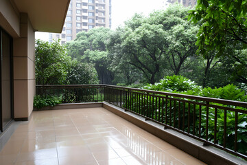 Tranquil balcony with lush greenery and city view
