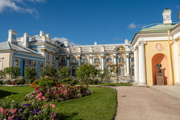 Exploring the grandeur of Catherine Palace surrounded by vibrant gardens in Tsarskoye Selo