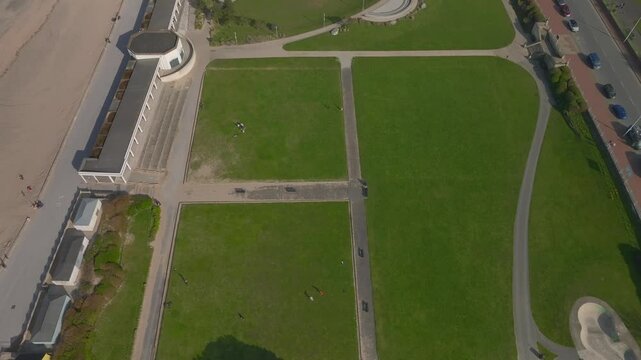 Marine Hall Gardens Fleetwood with reveal of fitness centre and car parks. Lancashire, UK.