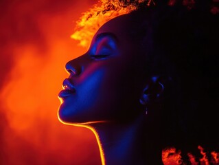 Person standing confidently in vibrant lighting, their face illuminated with modern and expressive energy