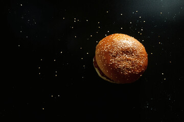 Juicy Hamburger on Black Background