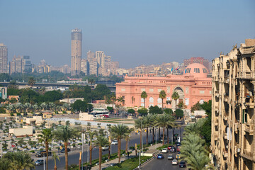 Cairo Museum and high-rise buildings at background. Tahrir square in Cairo, Egypt