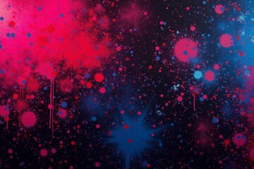 Abstract cosmic background with vibrant splashes of pink and blue on a dark surface. The paint splatters resemble a distant galaxy, creating a dynamic and artistic composition