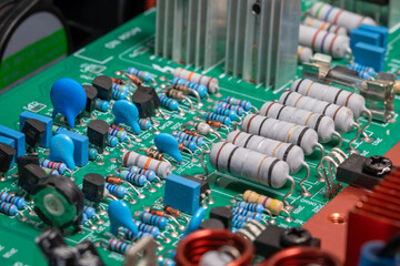 Electronic circuit board, transistors, resistors, capacitors, and diodes on the printed of an...