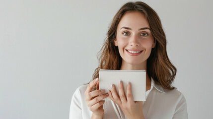 young beautiful woman holding pharmaceutical box