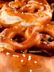 Traditional pretzels on rustic background