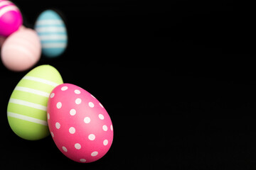 easter egg black background template empty blank copy space focus foreground bokeh blur