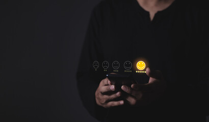 Happy Customer, Young Man hand touching emoji and five star to review and give 5 stars with very...