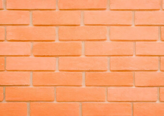 Obraz premium オレンジのレンガの背景テクスチャ