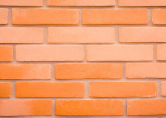 オレンジのレンガの背景テクスチャ