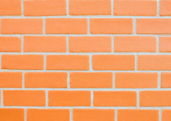 Obraz premium オレンジのレンガの背景テクスチャ
