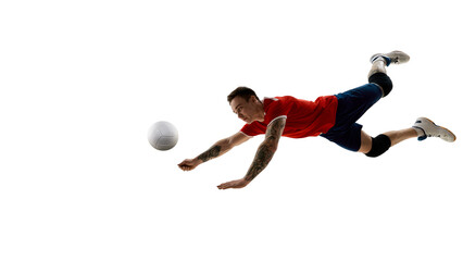 Dynamic image of determined volleyball player diving low, playing volleyball against white...