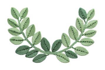Green embroidered leaf garland on black background, cut out