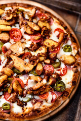 Gyros Pizza with jalapeno pepper and mozzarella cheese. Soft focus. Close up.	