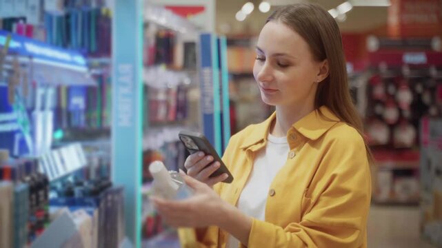 A person scans various micellar water products on the shelf while shopping at a retail store. The atmosphere is bright, showcasing numerous beauty items displayed for selection.