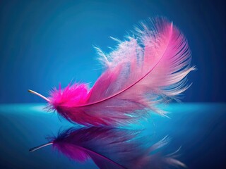 Obraz premium Ethereal pink feather photography; a fantasy bird in a surreal blue dream.