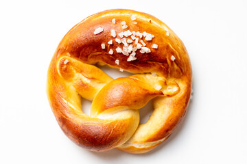 Pretzel with coarse salt on a white background.