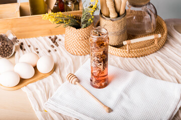 Healthy Icelandic moss for cough. Natural cough syrup in a glass jar. Light composition in rustic style. Cough treatment with folk methods.