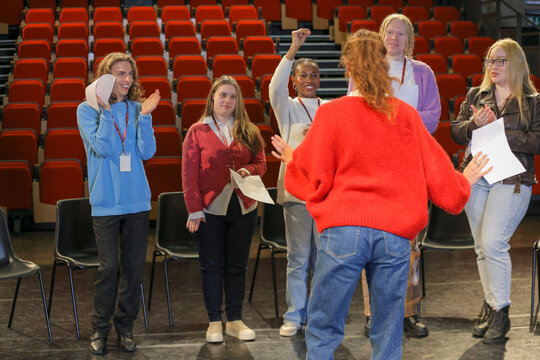 Persons with disabilities rehearsing on stage