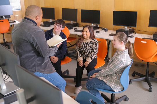 Disabled teacher and students at university