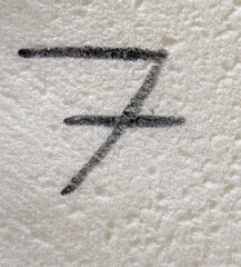 Written Wording in Distressed State Typography Found Ransom Number 7 Seven