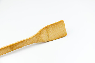 Cooking tool bamboo spatula on white background