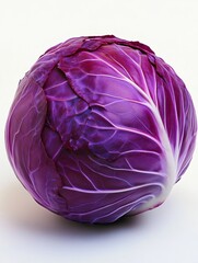 Obraz premium Fresh red cabbage on white background, showing vibrant purple leaves