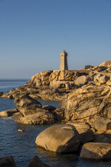 The Ploumanach Lighthouse officially the Mean Ruz Lighthouse located on a cape of pink granite rock located in Perros-Guirec, C&ocirc;tes-d'Armor, France,