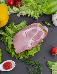 Meat and vegetables on the blackboard, food photo