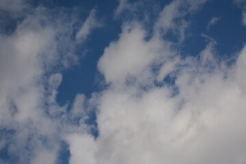 Clear blue sky with white clouds

