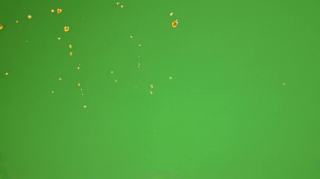 Coconut oil splash on green screen