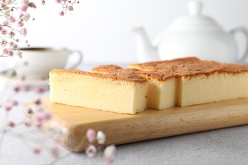 Tasty Japanese Castella sponge cake served on light table, closeup
