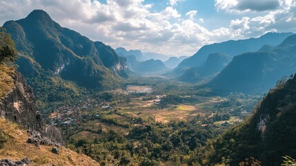 Naklejka premium Breathtaking Mountain Vista: A Scenic View from Nong Khiaw Village, Laos - A Journey through Asia's Majestic Heights