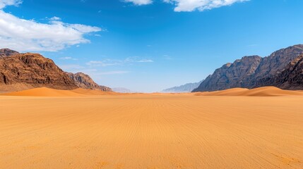 Vast desert landscape with mountains under clear blue sky