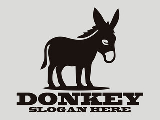Standing black donkey silhouette with detailed ears and legs. Logo vector donkey animal graphic design. Profile view black donkey head silhouette with detailed mane and ears. Animal graphic design