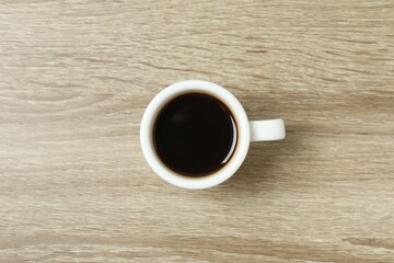Cuo of coffee on wooden background