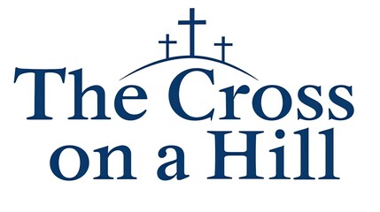 a shape with the text "The Cross on a Hill"