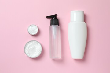 Natural cosmetic products a pink background, top view