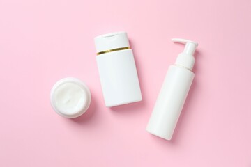 Natural cosmetic products a pink background, top view