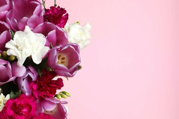 Beautiful bouquet of fresh flowers on a color background