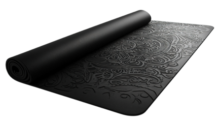 A stylish yoga mat in deep black with intricate mandala patterns, isolated on a transparent background. The design of the mat combines elegance with functionality