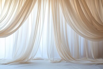 Sheer curtains softly draped in front of a bright window