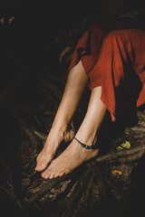 Woman connecting to mother earth and her feminine energy