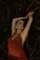 Woman connecting to mother earth and her feminine energy