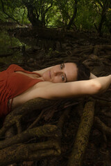 Woman connecting to mother earth and her feminine energy